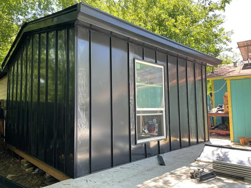 Black standing seam metal wall panels for Roof Inspection in North Augusta