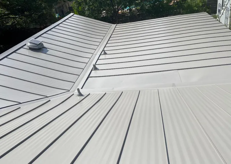 Solar attic fan installed on a metal roof for Roof Ventilation in North Augusta